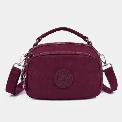 Limited Stock: Multi-Pocket Lightweight Nylon Crossbody Bag with Top Handle