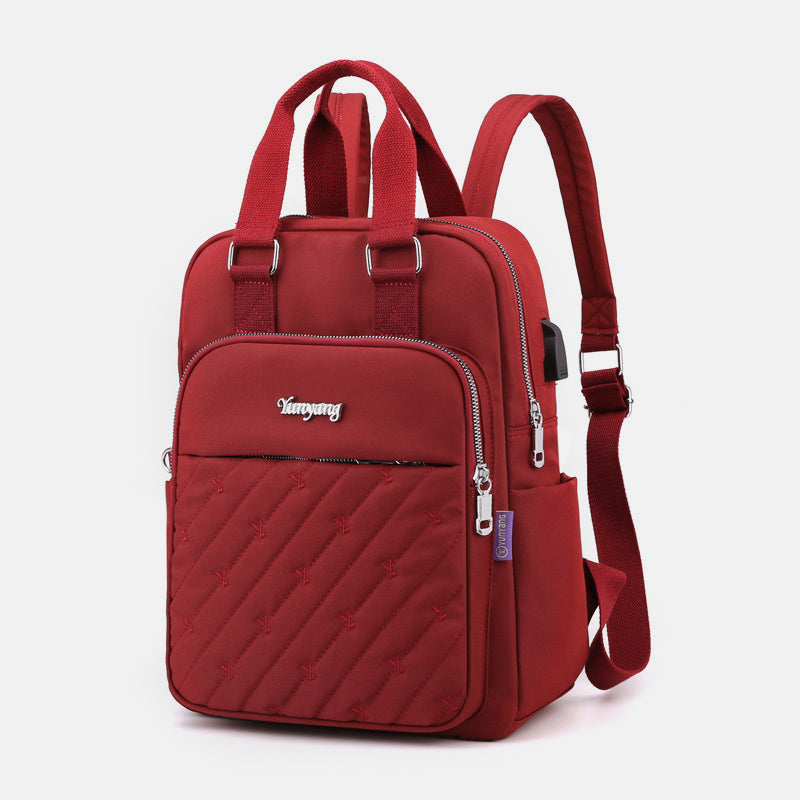 Lightweight Embossing Embroidery Backpack With USB Charging Port